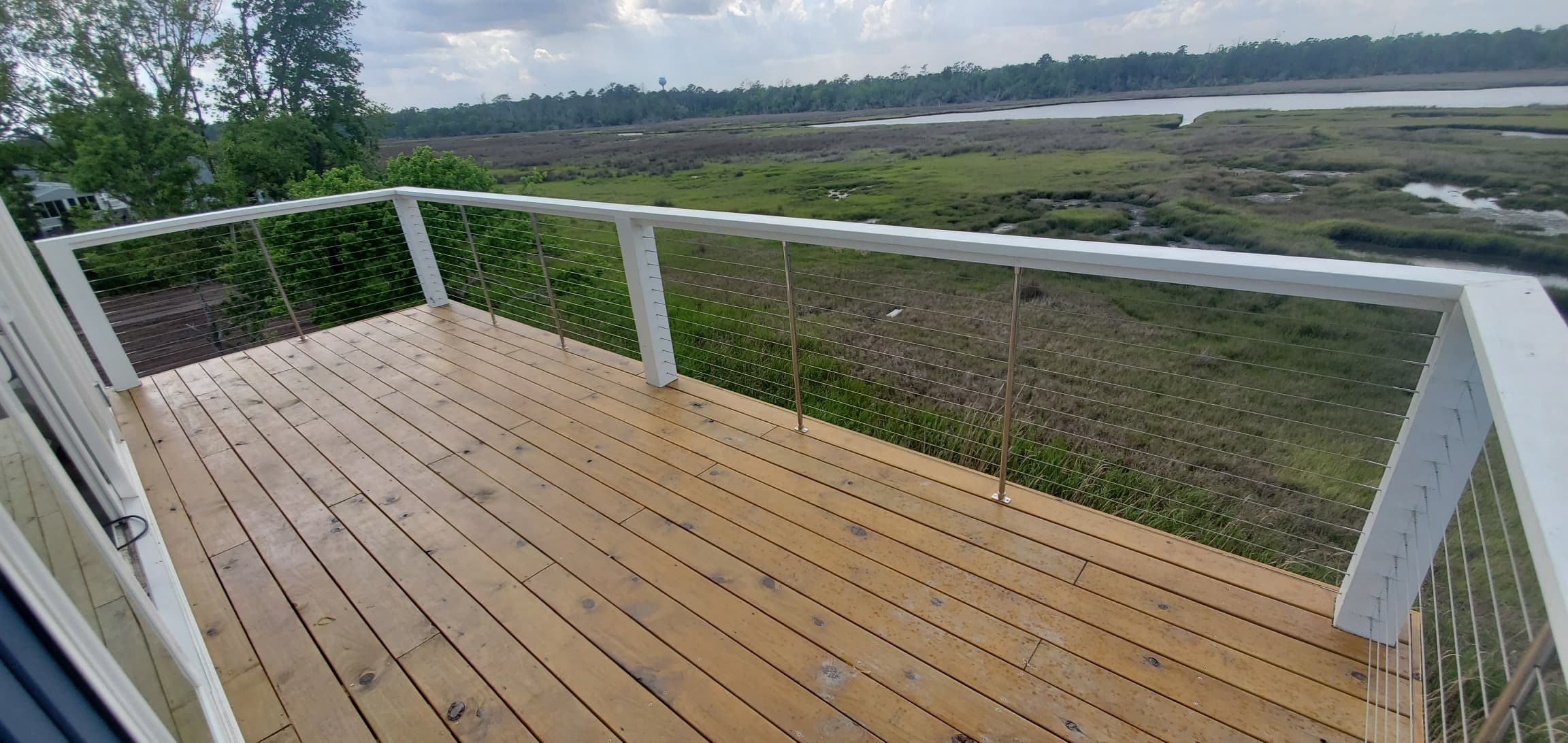 Elevated deck cable railing marsh view Eastern NC
